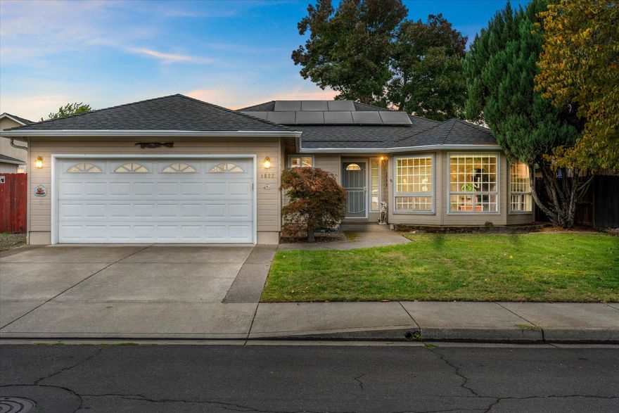 Average power bill just $18/month! Thanks to owned solar panels, this well-built 3-bedroom, 2-bath home in desirable SW Medford delivers exceptional energy efficiency and long-term savings—without sacrificing comfort or livability.  Inside, a thoughtful, functional floor plan offers a spacious living room with bay windows, a dedicated dining area, and a kitchen that flows seamlessly into a cozy eating nook perfect for everyday living and easy gatherings. Major upgrades provide true peace of mind, including a newer HVAC and water heater (2021), a 50-year roof (2022), and leaf guard gutters, ensuring dependable performance for years to come. Outside, the fenced backyard features in-ground timed sprinklers and small RV or boat parking, adding both convenience and flexibility.  This home offers a fantastic opportunity to update finishes and make it yours while enjoying efficiency, reliability, and a great location.