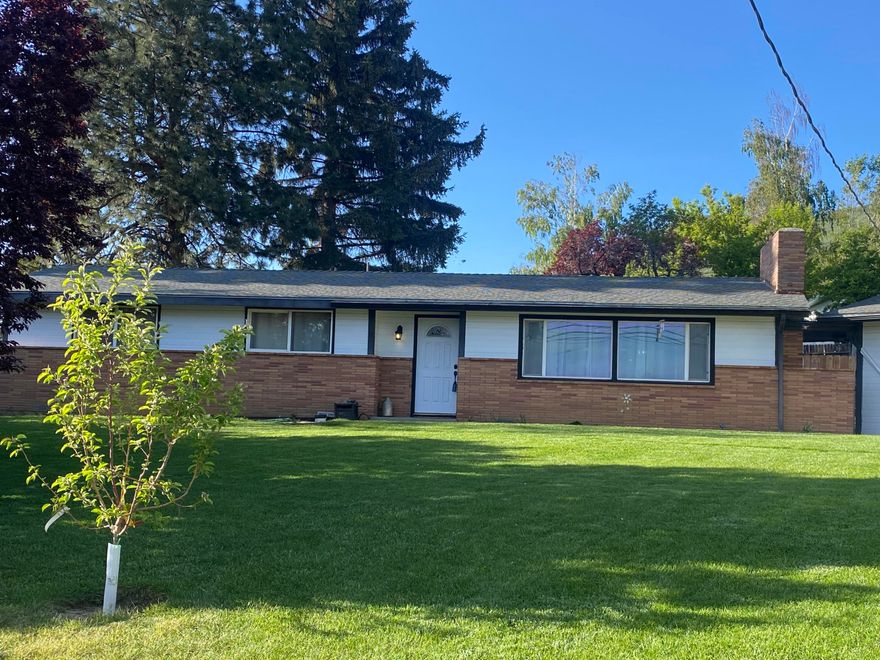 Moyina Heights turn key home !
3 bedroom 2 bath rancher.  2 year old HVAC, Roof 8-9 Years new, Fresh exterior paint. RV parking, New fencing, new garage door opener, 220 in the garage
This home is tastefully updated inside, REAL hardwood floors in great condition, fresh paint colors,  beautiful fireplace in the living room and the TV. stays ! Very nice floor plan with dining area. Great working kitchen that is completely updated  with gas range, new stainless refrigerator.  Lots of great built ins in this home. The light fixtures have been updated and Washer and dryer stay also !
 2 A/C rolling units stay.
The yard is lovely with chicken coop and fruit trees, deck in the back yard and riding lawn mower stays with an acceptable offer.