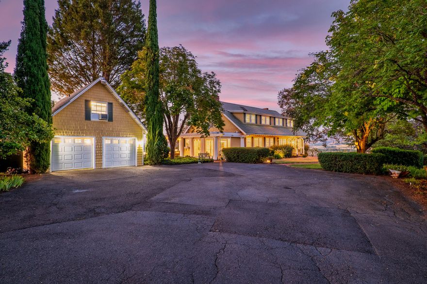 Historic Frank Clark home combines modern amenities and refined elegance with stunning 360 degree views atop Carpenter Hill. This charming 5 bed 3.5 bath home sits on 10+ ac. Plus, a newly remodeled 1/1 apartment above 2 car garage, convenient for guests, two family setup or potential rental income. Large open kitchen with a light and bright feel connecting to the informal dining area and traditional butler's pantry. Relax in the Master suite with its precisely designed and newly remodeled bathroom with heated floor, marble throughout with beautiful stand-alone brass double sinks. Recently replaced geo thermal heating and air unit as well as much of the plumbing throughout the home. This property is a working farm with 3 stall barn plus 2 tack rooms and chicken coop with specially assessed farm tax allowing for very low taxes. Too much to list, this is a must see unique irrigated property. POF required, Listing agent must be present. Buyer to do own due diligence.