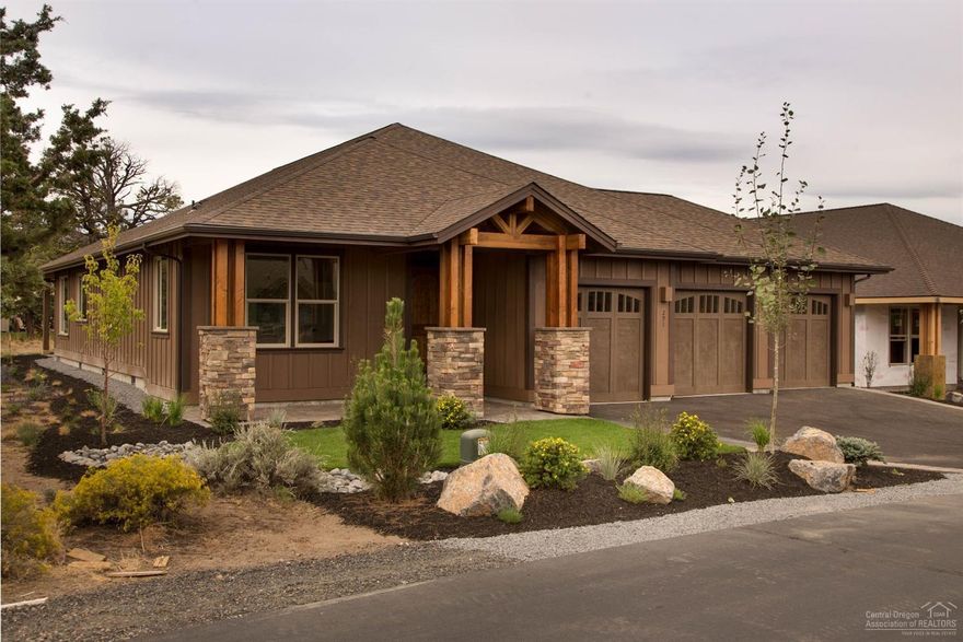 Beautiful Craftsman Style Home with Stone Exterior Accents, Gas Fireplace with Stained Mantle and Stone Accents, Hardwood Floors at Entry, Great Room and Kitchen/Dining, Island Slab Countertop in Kitchen, Knotty Alder Cabinets, Nice Pantry, Tiled Floors in Bathrooms, Glass Shower in Master Bath, Large Master Walkin Closet, Nice Patio off Master, Three Car Garage, Front and Back Landscaping with Paver Patio. New Construction.