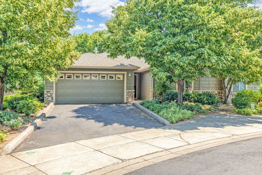 Single level townhome within the desirable Birchwood at Ashland Subdivision. These homes provide a user-friendly open floor plan with two bedrooms and two bathrooms. Approx. 1359 SF of living space with an attached garage on .12 of an acre lot, built in 2000. Recently updated kitchen as well as one of the bathrooms. Laminate flooring throughout the main living areas. Living room has a gas fireplace and a wall of windows for natural light and to enjoy the views of the backyard patio plantings. Dining room has access to the lovely patio area. Well planned out community with beautifully kept plantings, guest parking bay and pathways. Close to shopping, the YMCA, and city services.