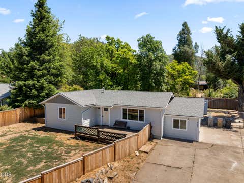 Tiny photo for 703 NE 10th Street, Grants Pass, OR 97526 (MLS # 220223468)
