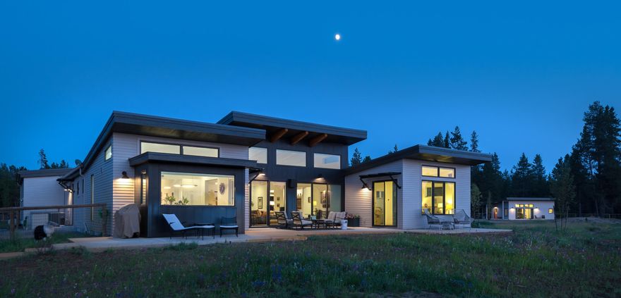Stunning contemporary home built in 2016 on 7.5 acres w/ separate studio + shop/barn & 400 feet of Little Deschutes River frontage.  

Light & bright 2,800 sf main home w/ custom cabinetry & high end design elements throughout. Porcelain tile floors, large great room w/ high ceilings, built-in cabinetry & office nook. Custom chef's kitchen w/ large island & breakfast area. Laundry room w/ dog wash, separate pantry room w/ storage. Oversized garage w/ workspace, equipment room & water filtration system. Wired for fiber internet.

Many extras- solar panels, Tesla battery backup power, security system, in-ground automated irrigation, newer well pump, landscaped w/ native plants, lighted gravel pathways, fully fenced & gated. Wildlife viewing & sunsets from several patios. Drive through barn/shop. Studio unit w/ full bath and wet bar.  Launch kayaks, SUP's & floats from the property. Crosswater, Caldera & Vendevert Ranch close by. Quick access to Hwy 97, local businesses, Sunriver and Bend