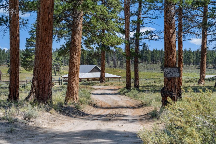 One-of -a kind, high desert gem: Nearly 160 acres of open meadow, surrounded by tall ponderosa pine and bordered by National forest and public land on all sides. Just past the property lies the stunning volcanic maar crater ''Hole in the Ground'' - a geological marvel.  (See Attached Video Tour) Currently operating as an equestrian event venue and horse camp, the property includes a functional residence, barn, charming shower house, arena, RV hook up, multiple horse corrals, several electric and water stations. The flat, open terrain also offers potential for a private airstrip. Only 60 minutes from the vibrant destination town of Bend, Oregon. This is a place of quiet beauty, wide skies, and endless possibility. Qualified inquiries may request a tour- bring your horse, and enjoy a guided trail ride through this unforgettable landscape.