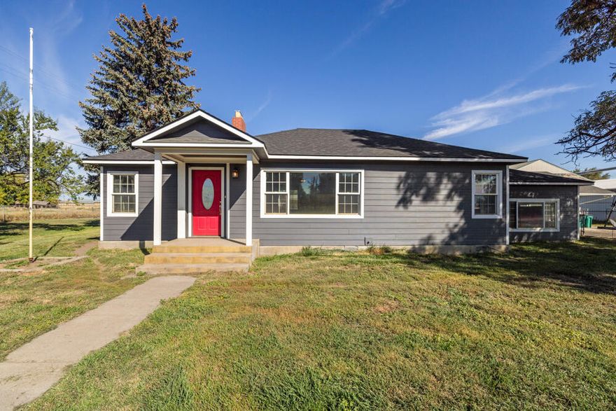 SELLERS NOW OFFERING $5,000 CREDIT TO BUYER! Work from home? Run a business you want to expand? Need space for your horses? Looking for flexible living arrangements in a floorplan? Meet all these expectations and more at this fantastic property! Offering 2,630 SF of living space, this 3 bedroom, 2 bathroom+ office property can do it all. New roof in 2024 plus updated paint, flooring, cabinetry, countertops and backsplash. Enjoy a cozy fire next to the certified woodstove while overlooking almost 2 acres of established landscaping. The covered patio is the perfect spot to enjoy those summer BBQ's and outdoor entertaining.  Love to garden? Plenty of space to expand on the existing greenhouse and raised beds with water and irrigation onsite. Ample storage plus small animal barn. Fully fenced and cross fenced. Make your appointment today!