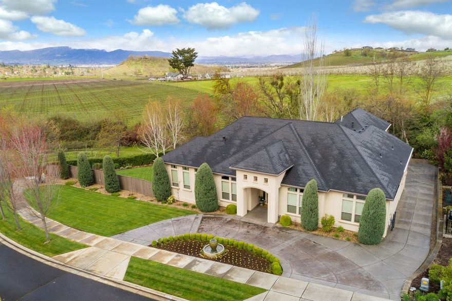What's on your checklist? Is it a beautiful view of the mountains and vineyards? Is it having a year round creek in your park-like back yard? Is it having a stunning home on an approx. half-acre level lot? Is it being located in a sought after school district?... or is it all of these and having an absolutely gorgeous home too? Features and amenities include: great room w/ gas f.p., gourmet kitchen-granite counters-huge island-commercial grade appliance, formal dining, travertine stone and custom hand-scraped-oil finished California chestnut floors, dedicated office, private guest quarters w/ living/dining/space, bathroom and kitchenette, spacious master suite w/gas f.p. and floor to ceiling cabinetry in walk-in closet, wine cellar, rec room, tons of storage, 3 car garage and much, much, much more!!!!