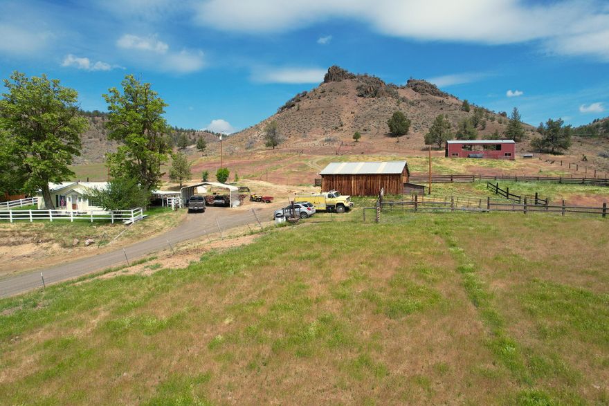 159.77 acre ranch overlooking the John Day River and the town of Spray, Oregon. This property features a 1472sqft 2 bedroom 1 bathroom home that has been nicely updated, has an office/3rd bedroom, great room, mud room, and a covered porch. There is a large insulated and heated shop, barn, hay barn, and a 1 bedroom guest quarters with a full bathroom and a party deck! 2 root cellars behind the home provide plenty of storage for all of your canned goods! Cry creek runs through the property and has water for most of the year. There is a small orchard and garden area, 3 wells on the property, and a spring with a spring box that feeds the ponds. Come see all that this property has to offer!