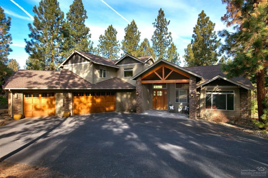 Live amongst the pines on the 9th fairway in the coveted golf community of Awbrey Glen! Upon entry you are greeted by expansive windows, vaulted ceilings w/ exposed beams & a grand rock fire place in the inviting great room. The main level hosts a generous master suite & large office (or additional bedroom) & upstairs are 2 bedrooms & a generous bonus room. The expansive rear deck offers indoor/outdoor living & the home is conveniently located within walking distance of the community pool, gym & clubhouse. Finishes include granite, hardwoods and stainless appliances
