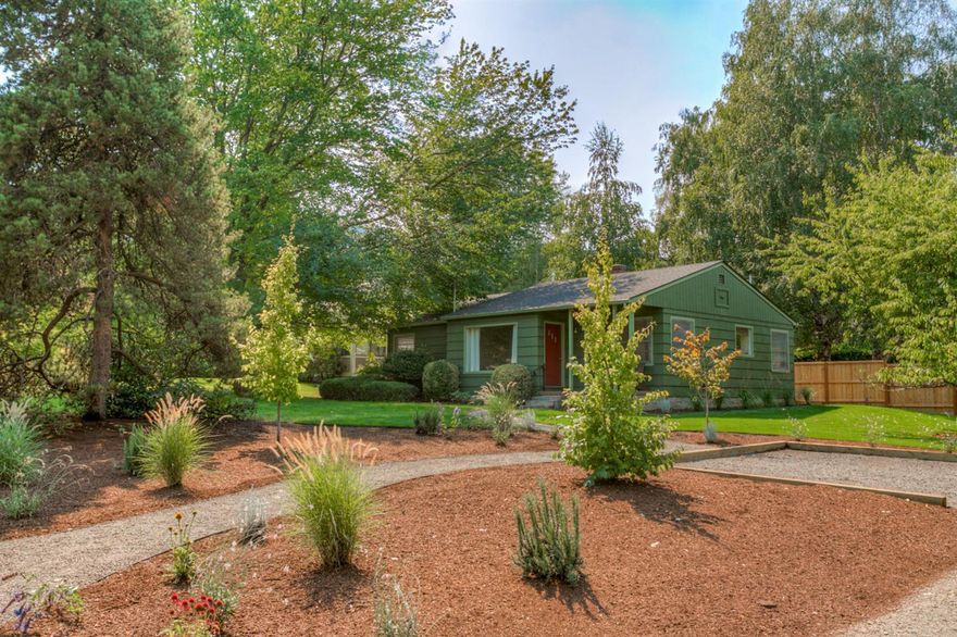 Charming, well-maintained single level cottage on a quiet and desirable street that is close to town. On this level lot sits a 3 Bedroom, 1 bath cottage style home. Recently refinished hardwood flooring and wood fireplace add warmth and character. Large picture windows allow plenty of natural light and views of the many mature trees that surround the property. Plenty of space for gardening (TID irrigation) and outdoor living. Wonderful opportunity for first time home buyer or those looking to downsize while also presenting plenty of opportunity to expand.