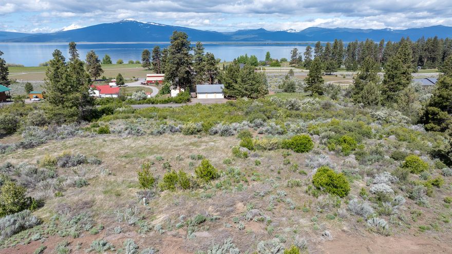 Amazing views from this .63 acre buildable lot that has septic tank and water in place, power is located on the corner of the lot. This beautiful lot is nice and private located in a Cul-de-sac with great views of Agency Lake and the Cascade Mountain Range.