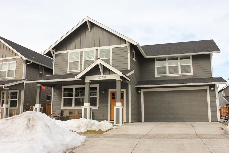 Absolutely gorgeous, light & bright, spacious almost new home in nice Bend location. 3 BR, 2.5 Bath + Bonus and Office/Den. Stunning white kitchen w/slab quartz island and white subway backsplash. Beautiful gas FP in great room w/upgraded hearth. Many custom built-ins & AC. High ceilings & master on the main w/vault. Shiplap in upstairs bedrooms. Nice sized backyard with custom raised bed. W/D, Refrigerator and all window coverings included. Impeccably maintained. Must see!