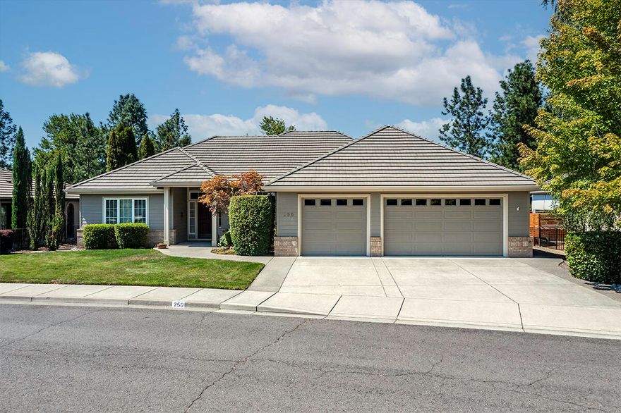 Stunning, contemporary single level 3 bed, 3 bath home perfectly positioned on the Rogue Valley Country Club! Walls of windows frame expansive, unobstructed views of the 8th fairway, filling the space w/abundant natural light. The split bedroom, open concept layout boasts clean lines, high end finishes & a continuous flow between the living, dining & kitchen areas - ideal for both everyday living & entertaining. Luxurious primary suite featuring a large walk-in closet, private patio access & spacious ensuite w/two vanities, a jetted tub, tile shower & private water closet. Gourmet kitchen equipped w/an oversized island, granite countertops, double ovens, appliance garage & gas cooktop. Additional features include hardwood floors, gas fireplace w/granite surround & mantle plus a dedicated laundry/mud room w/built-in cabinetry, work area & utility sink. 3-car garage, tile roof & mature, easy-care landscaping with a spacious covered patio & convenient remote-controlled sunshade.