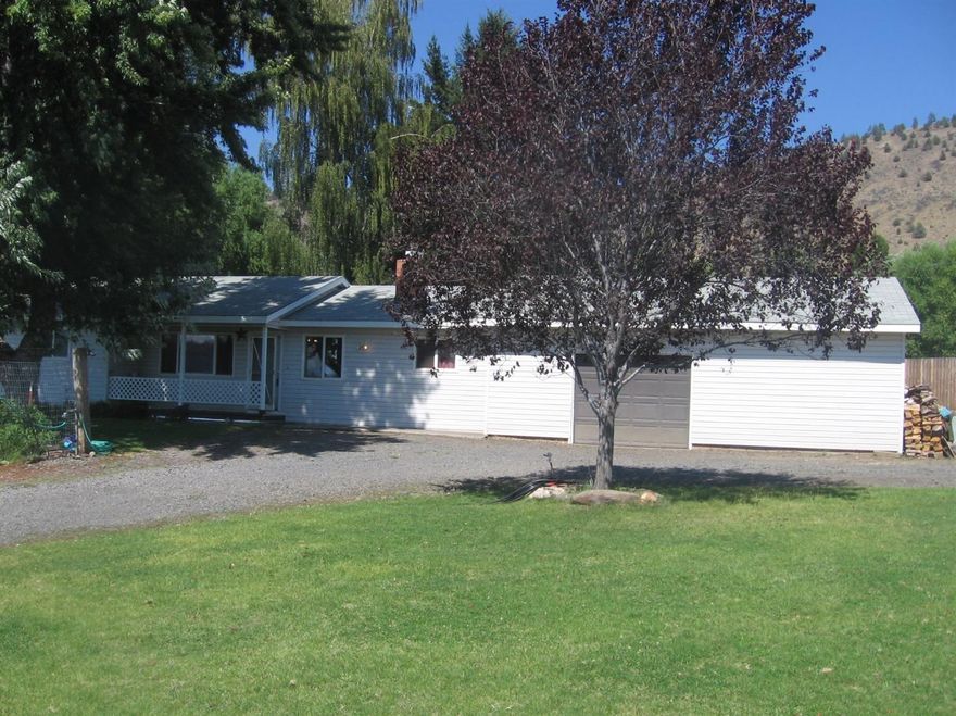 Great Ranch in Pine Grove on 1.16 Acres. 3 bedroom 2 bath. Living /dining room combo with Knotty Pine. Galley kitchen with Birch Cabinets. Come In and make this home your own with The updates you choose. 1 car Garage with a shop area 220 and a separate space for all your belongings. Wonderful Yard, Shelter and stalls for your animals all fenced and crossed fenced, plus a tack area. Garden spot, mature trees. Deck off the dining room for entertaining. Circular driveway, lots of room for all your toys. This is a must see ! Community well, water is $45.00 per month non metered.