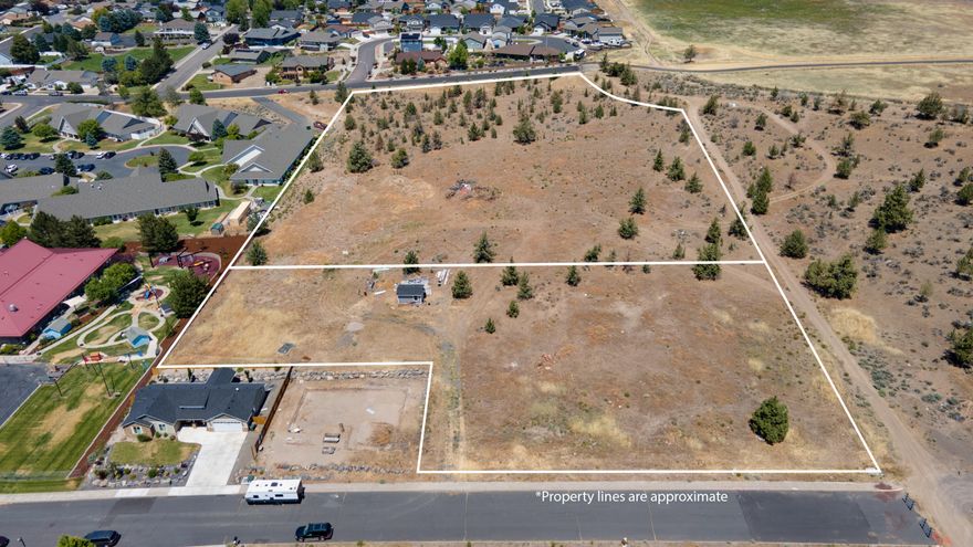 Prime development opportunity in Madras, Oregon! This 6 acre property offers the potential for up to 35 buildable lots, making it a standout option for developers and investors. Located in an excellent neighborhood and perched to capture stunning views, this parcel is perfectly positioned for a new residential community. Bordering the Willow Creek walking trail, this location blends natural beauty with convenience. Enjoy close proximity to schools, parks, and other local amenities all while being surrounded by the charm of Central Oregon. With the city of Madras continuing to grow, this is your chance to be part of its bright future. Don't miss out on this prime piece of land with unmatched potential!