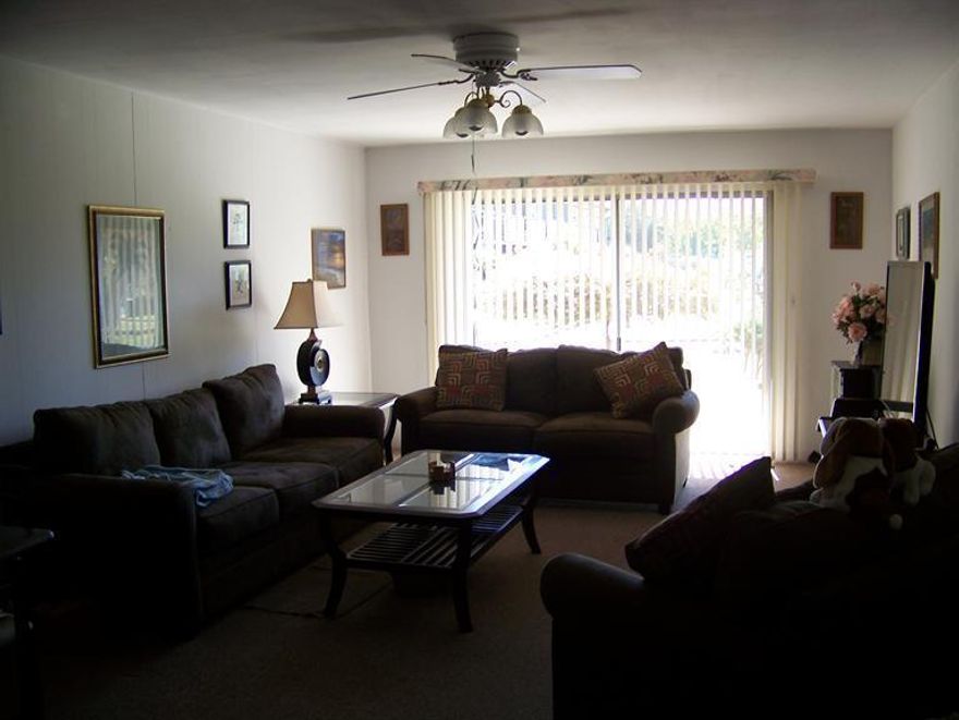 This is a ground floor unit in the 55+ Co-Op Community of Hawthorne Gardens. This home is located in the center of medical facilities, shopping, restaurants and movie theaters, public transportation. The kitchen is located as you walk in the front door and is efficiently set up. The living room features ceiling fans and an extra large patio door over looking the common area garden and pool areas. The two bedrooms are separated by the bathroom and it has a walk-in shower. Each bedroom has floor to ceiling closets and the master has a partition overlooking the grounds. There is a lot of pride in ownership in this project.