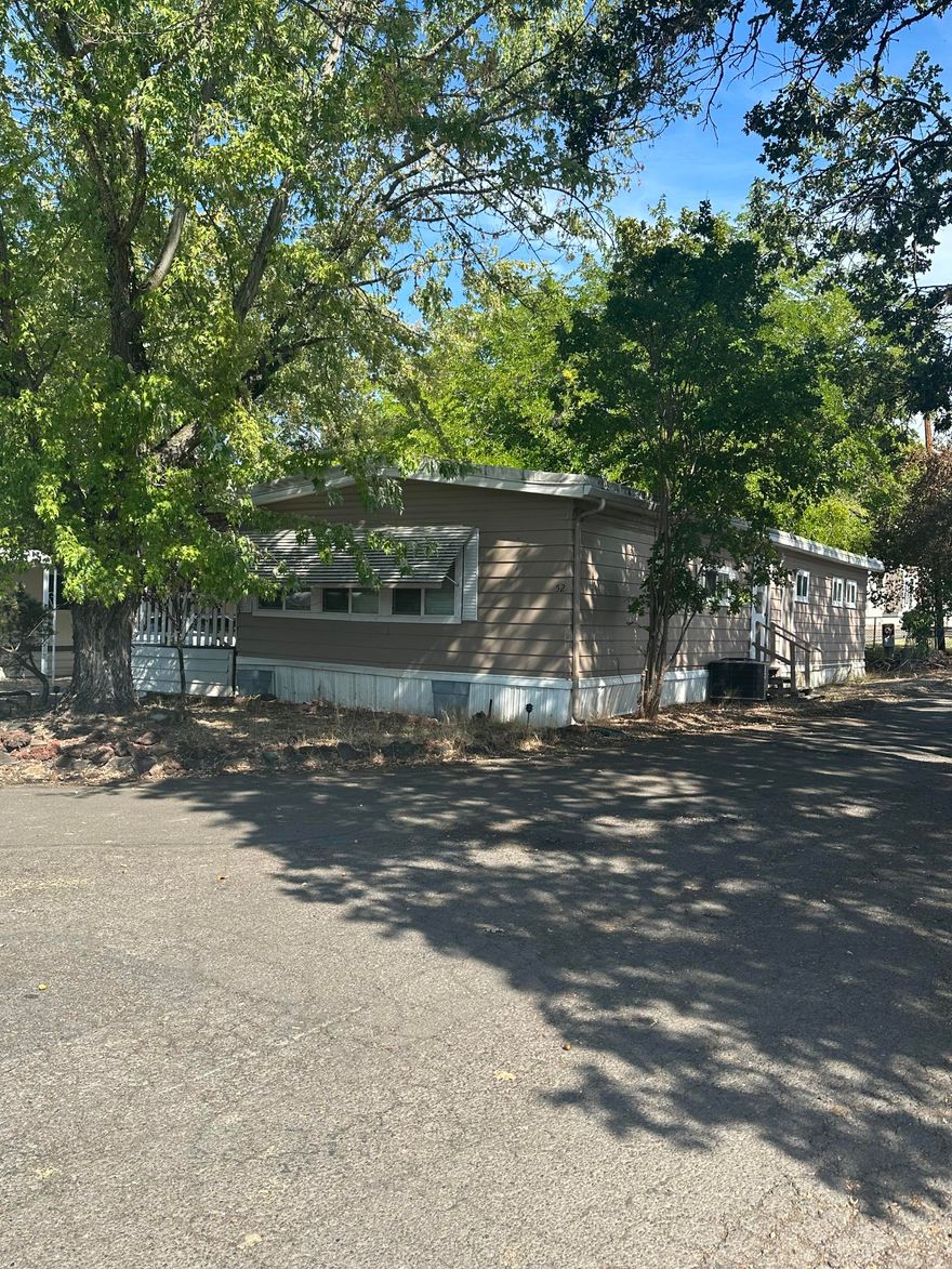 This 2-bedroom, 2-bath 1974 manufactured home features a comfortable layout and thoughtful updates, with room left to add your own finishing touches. Set in a welcoming park community, it's a great opportunity for those looking to create value and make a space truly their own.