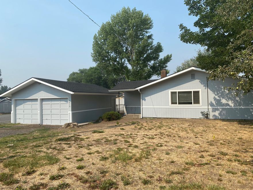 Remodeled and turn key home ready for  you.  This three bedroom two bath home has a built in fireplace wall  between the living room and a nice size den/family room which could be a fourth bedroom.  New roof, exterior paint, vinyl windows, newer kitchen cabinets and more. A 6 foot privacy fence gives lots of privacy for you, detached two car garage and a nice deck is all ready for you to come and see.