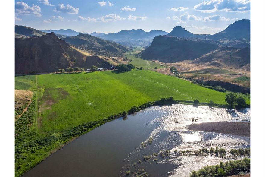 Cherry Creek Ranch is 28,274 contiguous deeded acres in Central Oregon used for grazing, hunting, fishing and recreation opportunities starting at the John Day River (1400 ft Elevation) to the top of Tracy Mountain (5048 ft) with beautiful views, forest, timbered draws, rimrocks, meadows, springs and numerous spring fed creeks. John Day River (3rd longest free flowing river in US) and approx. 17 miles of Cherry Creek run from south to north the length of the ranch. Ranch is home to abundant wildlife with a history of outstanding fishing, elk, mule deer and bird hunting. Private 6 acre stocked (trout) Cherry Creek Reservoir is for irrigation storage/recreation. Headquarters: 2 ranch homes, barn, shop, corrals, orchard, fields with 375+/- acres water rights. Ranch is steeped in history with historic homesteads and qualifies for LOP Hunting tags in the Grizzly Unit (Buyer to verify quantity/year) and is a unique opportunity to own a ranch full of adventure, desert beauty and live water!