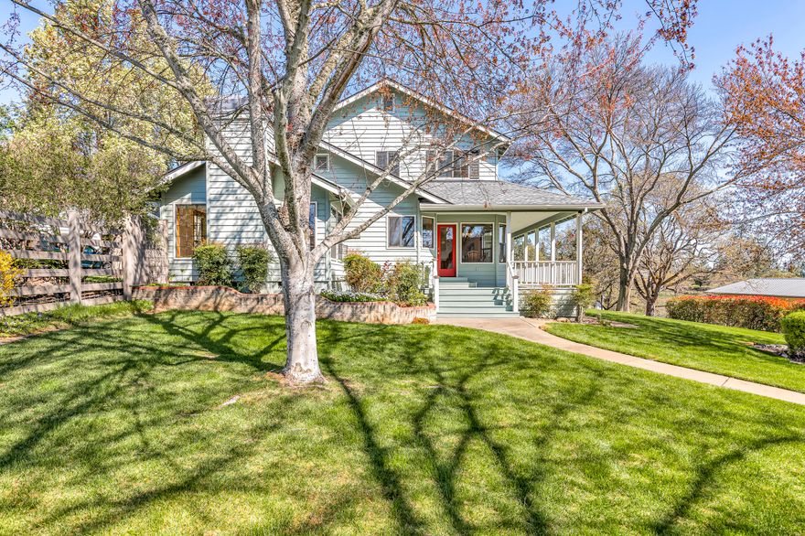 Stunning rural retreat conveniently located just outside Historic Jacksonville, OR! Nestled on 2-acres, this 4 bed, 2.5 bath home enjoys breathtaking views of the valley & surrounding mountains. Positioned at the end of an extended paved driveway, the home overlooks the beautiful, fenced backyard w/a wraparound deck, outdoor gas fireplace & large, inviting inground pool. Park like grounds w/mature trees & plants to enjoy, as you watch the valley lights start to twinkle at dusk. Spacious kitchen w/granite countertops & a center island open to the living & dining areas. Main level primary suite featuring a large walk-in closet & ensuite w/a dual sink vanity, jetted tub & private water closet. Office/den w/glass French doors, 2nd living area w/fireplace, large laundry/mud room & 3 generously sized guest bedrooms. Oversized 4-car garage w/workbench & storage cabinets. Huge shop/RV storage building, RV carport & large open space perfect for horses, 4-H animals or garden area!