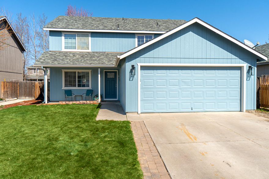 Conveniently located home in SW Redmond. Spacious living areas off the main entry w/ room for additional home office or classroom. Newly updated kitchen features granite counters, double farm house sink, soft close cabinets & drawers, a built in microwave, refrigerator & a large central island for plenty of prep space. Sliding door off the dining area opens to a partially covered porch for year round enjoyment. Primary bedroom features a walk in closet, dual bath/shower combo, & dual vanities. Three additional bedrooms as well as a full bath are upstairs. Laundry and additional half bath is situated downstairs off the garage & main living area, washer/dryer negotiable. Forced air, pellet stove, double car garage w/ garage door opener, fully fenced & landscaped w/ built in garden beds ready to go for spring w/ small shed out back as well. Brand new interior & exterior paint. Open house this weekend only. Friday 4/2, 4:30-6:30pm & Saturday 4/3, 11:00am-4:00pm.