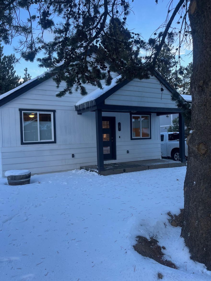 Welcome to a meticulously renovated turnkey 3 unit investment property! Originally constructed in 1920, this charming home with a detached garage has undergone a complete transformation, now standing as a modern bungalow with a separate apartment and a detached Accessory Dwelling Unit (ADU). Every inch of this property has been carefully revitalized to offer contemporary living in the heart of Bend.
The comprehensive renovation includes a new roof, windows, siding, plumbing, electrical systems, drywall, and flooring throughout. The thoughtful redesign ensures that all three units are on separate meters, providing efficiency and privacy for each residence.