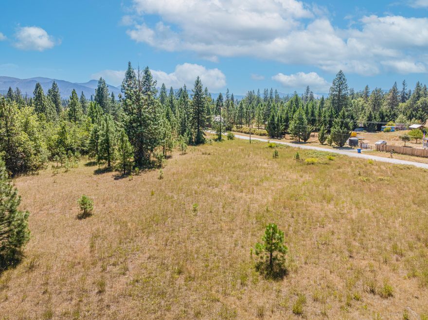 Discover your piece of paradise in Cave Junction, Oregon! Nestled on 8.81 level, partially treed acres, this serene haven offers endless possibilities. Whether you are building your dream home, starting a charming homestead, or simply escaping the hustle and bustle, this affordable gem is your canvas for creativity. Make this picturesque property your very own slice of Oregon paradise!