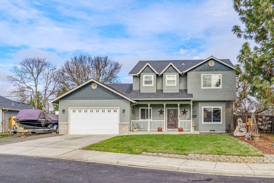 Talk about the perfect location! This beautiful 2-story home is located near the end of a lovely quiet cul-de-sac & a stones throw to the famous Eagle Point Golf Course. Gorgeous hardwood floors welcome you into this 3+ bd., 2 1/2 ba. home. Your culinary skills await in the expansive kitchen complete w/granite countertops, custom cabinetry & stainless steel appliances. A wide staircase leads to a stunning oversized master ensuite, where vaulted ceilings, hickory floors & two closets complete this wonderfully designed space. Master bath includes dual vanity sinks, jetted tub & separate shower. Non-slip stone tiles lead to a private terrace where you can sip your coffee & take in the beauty of the golf course. Upstairs also has two more bedrooms and a bathroom. The backyard is great for entertaining w/a spacious trex deck complete & enough built in seating to accommodate all your guests. Plenty of space for an RV and/or boat. Storage abounds w/a 10'x16' shed, tool & lawnmower sheds