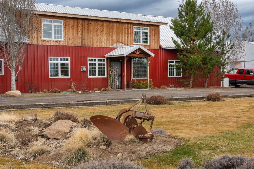 The Tumalo Lavender Farm is ideally located north of the thriving metropolis of Tumalo in sunny Central Oregon. This special property includes Cascade Mountain Views, irrigation water rights, and approximatley 4.5 acres of mature, certified organic lavendar plants. There are currently two dwellings: There is a 2,080 sf permitted ''barn'' dominium, and a 1,770 sf Manufactured home which has been permitted for family and farm help. In addition, there are 5 main greenhouse structures which are all heated and watered, two shop/processing/storage areas, a certified kitchen, and a country store for retail sales.