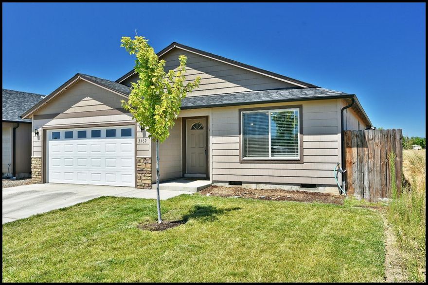 What a great home that is like new! Just 3 years old, this house has a great floor plan. Enter into an inviting living room complete with a ceiling fan and an open concept that leads to the kitchen. In the kitchen you will find richly stained cabinets with complimentary flooring and nice granite counters. Through the kitchen you will find the dining room. All flow from front to back. From the dining room you can access the nicely landscaped backyard complete with an inviting deck, perfect for BBQ's! Down the hall are all 3 bedrooms. All good sized. The laundry is inside as well! Hurry and tour this wonderful property before it's gone!