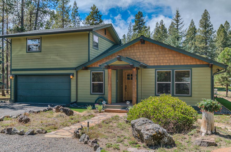 Experience the ultimate in riverfront living on the serene Big Deschutes River.  This stunning home sits just 40 feet off the river and was remodeled in 2010. Two primary suites with one on the main floor that includes a spacious double vanity, granite solid countertop, enclosed toilet, heated tile floors and tile shower. The second primary suite is on the upper level with carpet, a walk-in closet and heated tile floors in the bathroom. The third bedroom could also make a great den/office. Enjoy the warmth of Douglas fir wood floors and the elegance of slab granite countertops in the kitchen. Vaulted great room, stainless appliances, a double drawer dishwasher, propane oven and cooktop, knotty alder cabinets, beautiful barn wood wall, central vacuum, and vinyl windows. Cozy up by the slate surround propane fireplace with a mantle.  Outside, a 16X13 dock and 28X12 deck await. This gated property is landscaped with a drip system and has a full RV hook up.10x10 storage shed