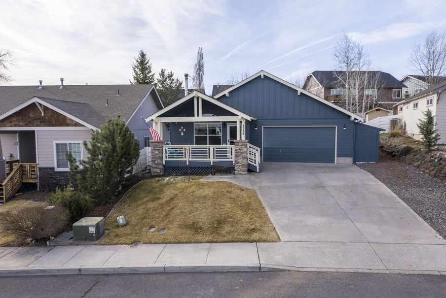 Gorgeous 3 bed, 2 bath home w/ a den nestled in a quiet neighborhood located in SW Redmond. Enjoy views of Smith Rock, peek-a-boo views of Mt. Hood & beyond from your expansive covered front porch. Tiled entry leads into the open floorplan w/ plenty of natural light throughout the home. Vaulted main living area w/ a cozy corner wood burning fireplace. Spacious kitchen ftrs tile flooring, an abundance of cabinetry, central island w/ storage, & a large dining area.  Well-appointed primary suite w/ vaulted ceiling, walk-in closet, tiled bathroom floors & counters, plus a mud-set walk in tile shower. Two additional guest rooms share a full bath w/ the oversized laundry room & den conveniently located as well.  Great outdoor living space with trex deck and concrete patio. Xeroscaped backyard, gravel RV parking, plus an enclosed woodshed on side of home. Conveniently located near Umatilla sports complex and other parks in the area! Don't miss!