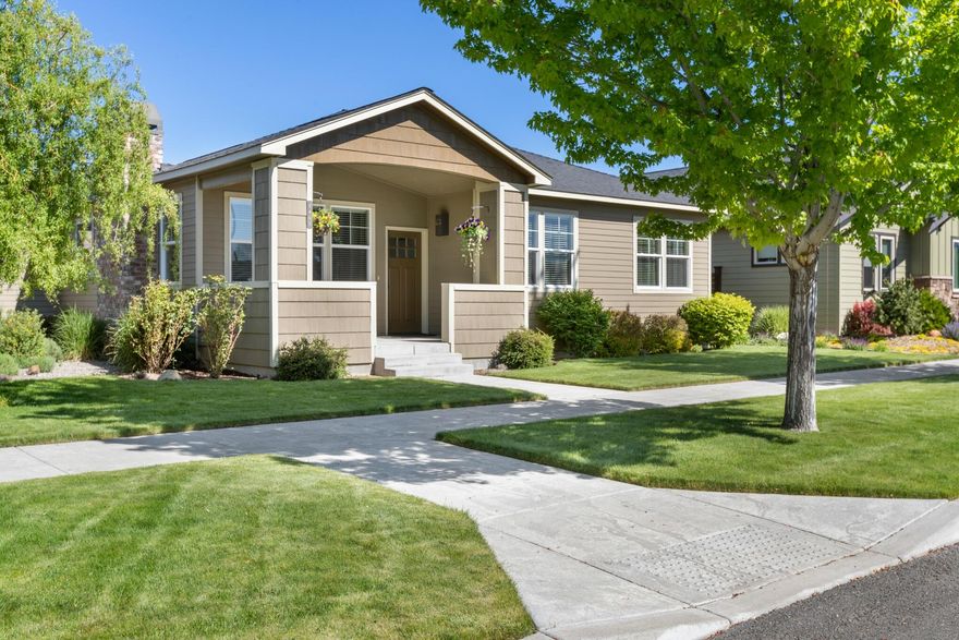 Lovely Craftsman home in Ironhorse. Sit on the covered porch and view Barnes Butte and the picturesque neighborhood where everyone takes pride in their homes and landscaping. Only 3 blocks to Barnes Butte Elementary School and close to Barnes Butte hiking trails. This home feels larger than the square footage indicates with vaulted living, dining, kitchen, and in the three bedrooms.  There is a gas fireplace in living room and plenty of windows to let in light. Immaculately landscaped front and private backyard with patio and gas for your barbeque. Large, two car garage with custom shelving.