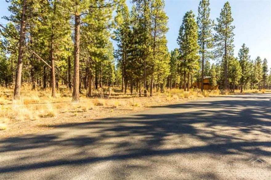 Large wooded homesite in a peaceful and private setting in Caldera Springs. Convenient access to trails, and all the community amenities including the Quarry Pool and Fitness Center, Ponderosa Park, sports courts, lakes for kayaking, paddle board and fishing, and Caldera Links and Golf Park. Ask about home plans that have been designed for this lot.