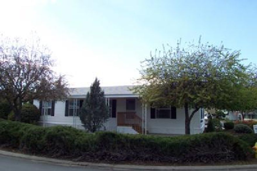 Bear Lake Mobile Estates - close to shopping. This one is immaculate. Landscaping is easy care, clean as a whistle. Financing available. 1997 / 1248 sq. ft. Park rent is $418.00 - includes clubhouse, water, sewer, and trash.