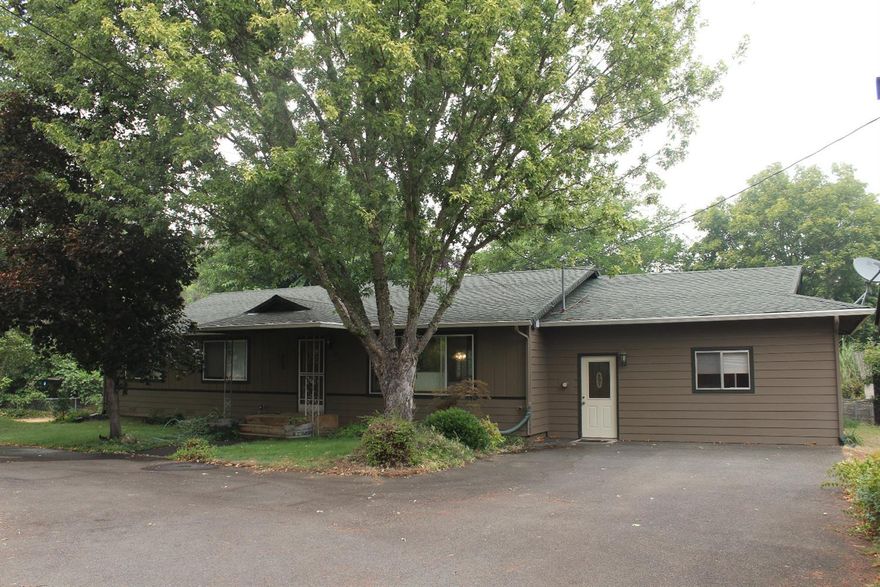 Beautiful well kept home on 1.03 Acre with approximately 2/3 of acre fenced in the back of home. There is a very nice garden area, a small barn, small decorative ponds, and wonderful fruit trees to enjoy the summer offerings (Peach, Apple, Grapes, Blueberries, Figs, Italian Plum, Black berries thorn less, Raspberries, Lemon Tree. There is also beautiful bamboo and big leaf fruitless mulberry shade trees. The circle asphalt driveway makes entry and exit of the property very convenient. This home is warm and inviting and feels like home. The very large back yard has a lovey Trex Deck for relaxing and BBQing and gives much privacy and room to spread out and enjoy!