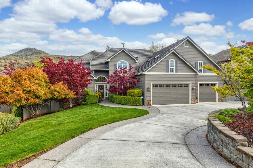 Timeless & modern luxury come together in this 2 story Saddle Ridge home. Situated on a .39acre lot just minutes from Roxy Ann Peak in one of East Medford's most sought-after neighborhoods.  Thoughtfully detailed w/a circular driveway for ease of access. This home is layered with the things you love like open spaces & bright living areas. The grand entry showcases architectural details & a wall of windows to backyard & mountain views. The 2-story great room is a sight w/soaring ceiling, built ins surround fireplace & natural light. Chef's kitchen w/eat-in bar, Viking range & pantry plus breakfast nook. Modern home office w/ French doors. Main floor master suite retreat w/door to deck, plus spa like bath w/double vanity, 2 huge closets, bath & shower. Upstairs leads to loft, 3 bedrooms, bath & bonus room. The backyard oasis is destined to be your favorite place to relax on the deck, soak in the new sunken hot tub or the inground pool. Plus, a huge RV pad for your toys & 3 car garage.