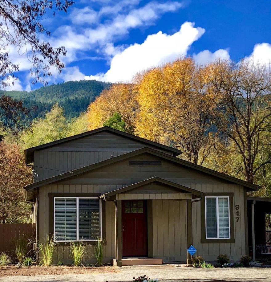 Creek front Beauty in Rogue River! Live right in town with a feel of nature and country! This beautiful 4 bedroom house has it all. You will love the open and inviting feel of this very tastefully remodeled home, with it's rustic and custom touches. Move right in, it is turn key with brand new flooring, appliances, fixtures, double paned windows, cabinets and so much more. The kitchen is to die for and the upstairs master bedroom has a fantastic spacious bathroom and a view deck to enjoy your morning coffee and the peaceful scenery of Evans Creek, right in your back yard. The large 1/2+acre lot with its abundance of water is a gardener's dream. So close to schools, shopping and downtown and still you can host your guests in your own peaceful outdoor paradise. This property has endless possibilities! Hurry, it will not last! Please see agent remarks.