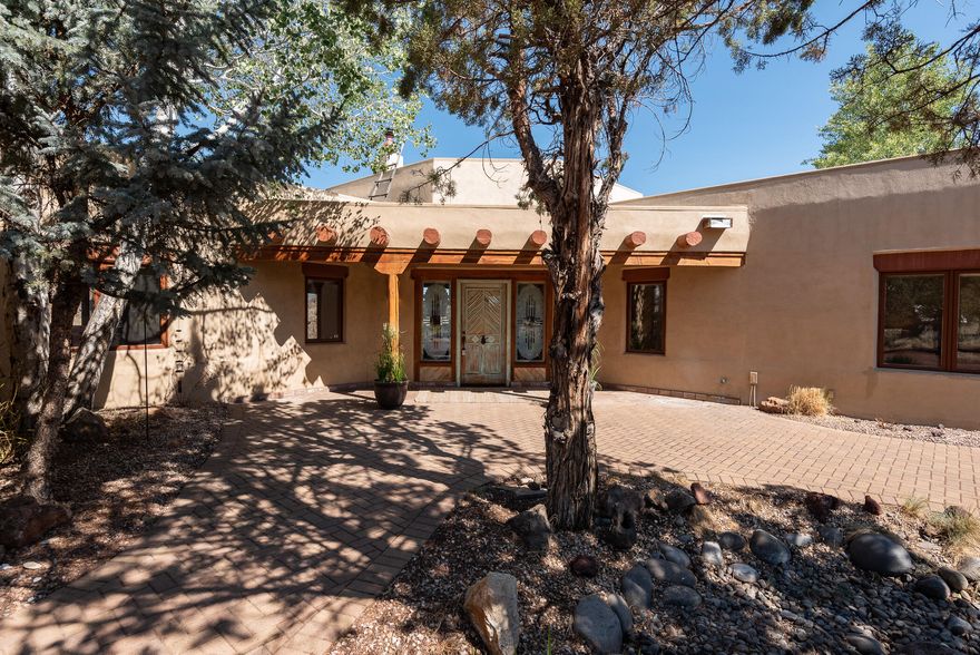 Architecture and nature unite on this private 2.69 acre lot bordering the Deschutes and overlooking Cascades to the west, BLM to the north and Smith Rock out to to the east. This Santa Fe one-level offers large expanses of windows bring the outdoors inside, highlighting the canyon, mountains and river. Enjoy authentic beamed ceilings, heated tile flooring and fireplace dividing living and dining areas as well as beautiful sunroom and detached shop/studio space. 11 minute commute to shopping and Redmond Municipal Airport.