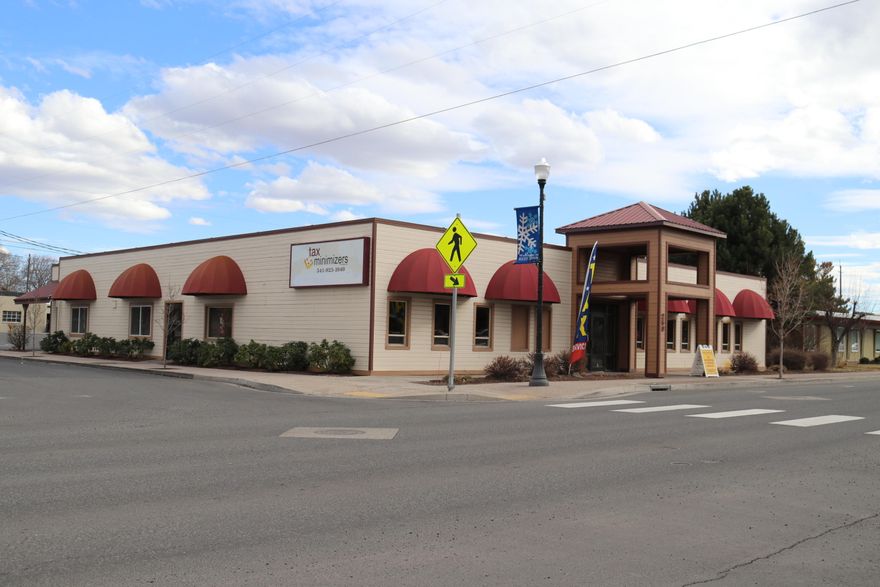 This is a great opportunity for owner user or investor to buy downtown property with frontage on both 5th and 6th Street and 28 on-site parking spots. The building has been remodeled with two finished suites in the front part of the building and two mostly finished suites in the rear of the building. This gives a buyer the opportunity to finish the spaces to their specifications. Currently one tenant leases 2,070 square feet. The other three suites are available for lease. Site includes 7,541 square foot building plus adjoining paved parking lot with 28 parking spots on .19 acres. Includes signage on the building and free standing signage on 5th Street.