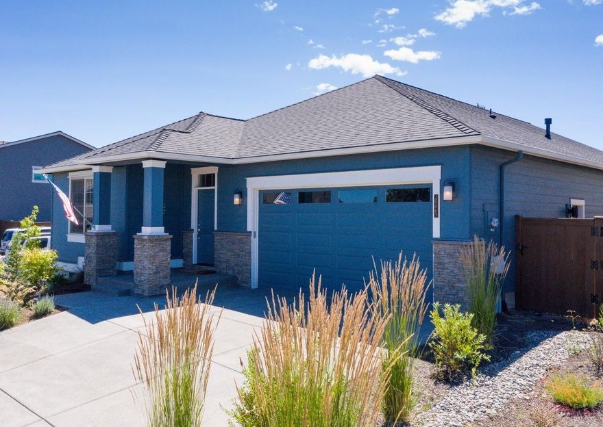 Wonderful resale opportunity The Bridges @ Shadow Glen.  Desirable Pahlisch Home community conveniently located in SE Bend just east of the new Caldera High School & the new Murphy Rd interchange. Built in 2018-lightly lived-in with pride of craftsmanship & architectural features.  SINGLE  level home with oversized garage, separate master suite/ensuite. Open great room, large entry foyer hallway, coffered ceilings, modern décor' lighting, Chef's kitchen w/built-in KitchenAid appliances, walk in pantry, Quartz counters, expansive kitchen island with/breakfast bar, 5 burner gas range/stainless hood, hardwood flooring and covered back paver patio fenced and private make entertaining in your wonderful new home a breeze. Master features a tile shower & large walk-in closet. Oversized garage w/ 11x11 shop area. You will love all the community amenities that include:  pool, gym, game room, clubhouse, walking trails & 15 acres of park-like common area! Dreams become a reality with this home!