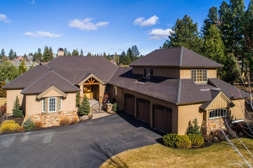 Stunning custom Northwest-style home in The Reserves at Broken Top. Main level living with an inviting, open floor plan that welcomes you with warm designer finishes throughout. Spacious great room features vaulted ceilings, wood beams, stone fireplace. Gourmet kitchen complete w/ slab granite counters, S/S appliances, custom cabinets. Master suite & 2 guest suites on first level. Bonus room & office upstairs over 3 car garage. Well maintained & beautifully landscaped yard w/ large deck. Great NW location!