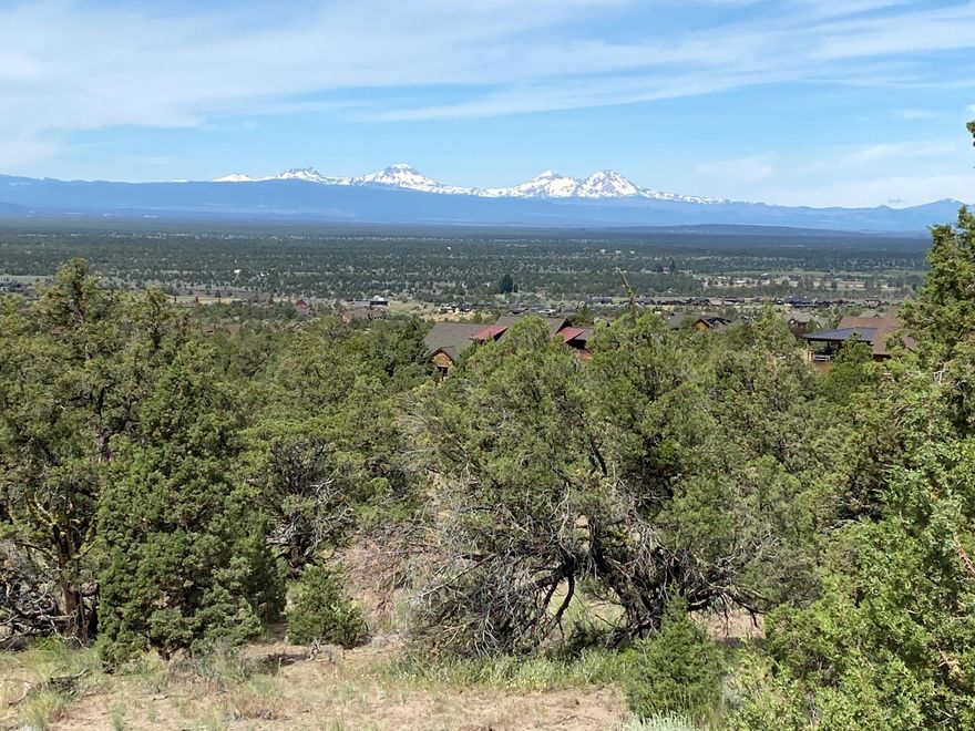 Stunning panoramic Cascade Mountain views abound on this homesite that is positioned high atop hat Rock Loop. Mature juniper offers an abundance of privacy without sacrificing any of the sweeping views over the High Desert floor and up to the rugged Cascade Mountains. The homesite offers an ideal location to build your dream residence. Enjoy all the Benefits of Membership, Athletic Center with 3 Pools, Water Slide and Lazy River, Cascade Pool (Adult Only Pool), Equestrian Center, 18 Hole Award Winning Golf Course, Spa Brasada, Member Club Room, Restaurants, Hiking, Biking, Fishing, Horse Back Riding and much more!