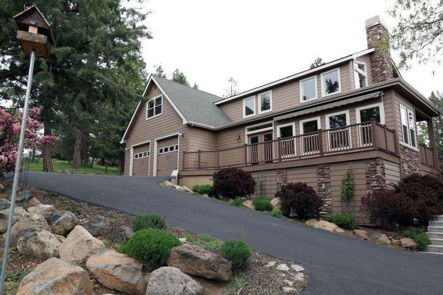 Feels Like A Treehouse! Bring The Outside In With Views Of The Mountains And Trees. The Soaring Great Room Opens To The Kitchen, Dining Room And Sun Room. Main Level Living Includes Master Suite, Office/Media Room, Powder Room, Laundry Room And Over Sized Double Garage. Hickory And Slate Flooring On The Main Level Set The Tone For The Gracious Amenities Through Out. Upper Level Has 2 Bedrooms, Bath, Bonus Room And Office Or Reading Nooks. Features Include Stainless Appliances And Gas Fireplace. See MoreThe Huge Kitchen Features Black Crushed Granite Sinks, Granite Counter Tops With Raised Island, Tumbled Marble Back Splash, Electrolux Stainless Appliances, 5 Burner Gas Top With Custom Hood, Built In Oven And Microwave/Convection Plus Warming Drawer, Pantry And Desk Area. The Cherry Stained Cabinetry Is Accented By Distressed Glass And Under Counter Lighting. The Master Bath Is A Luxurious With Travertine Floors, Jetted Tub, Custom Tile And Glass Tile Shower And Separate Vanities