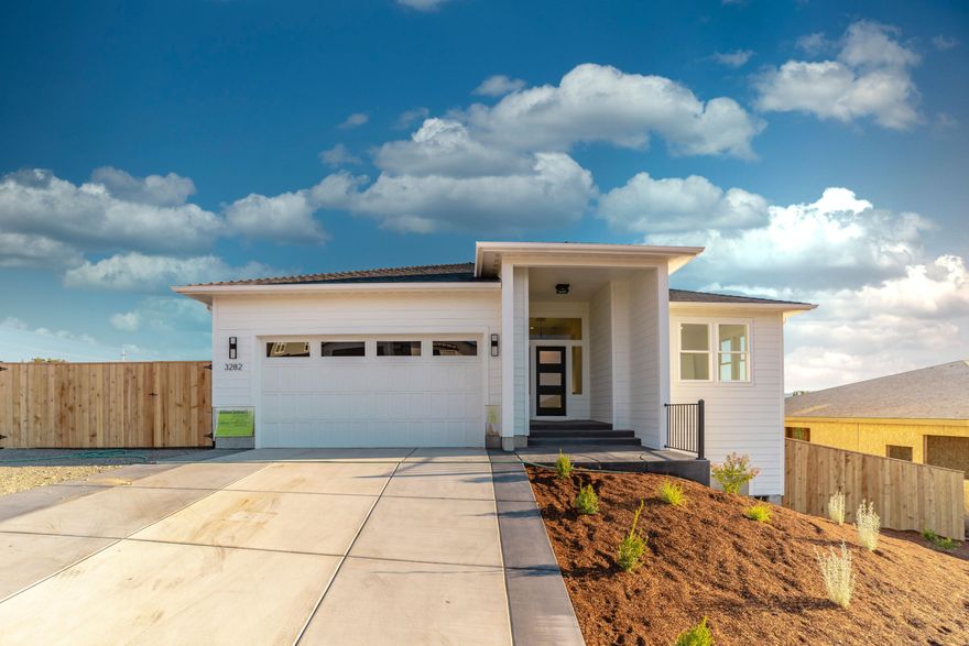 Fresh, new construction in Cedar Landing built by Chamberlin Homes. This property  has great views and a large fenced yard. The interior is a rustic modern with an excellent floor plan. Master is on the main level with an additional bedroom. Kitchen is open and full of light. Large deck off the main level. Downstairs is an additional bedroom and bathroom, as well as a huge unfinished storage area that could be converted and finished into whatever you need. Lots of custom features, classy gas fireplace in the living room. Will be completed early October. Large , potential RV/boat/ trailer parking on the side of the home.