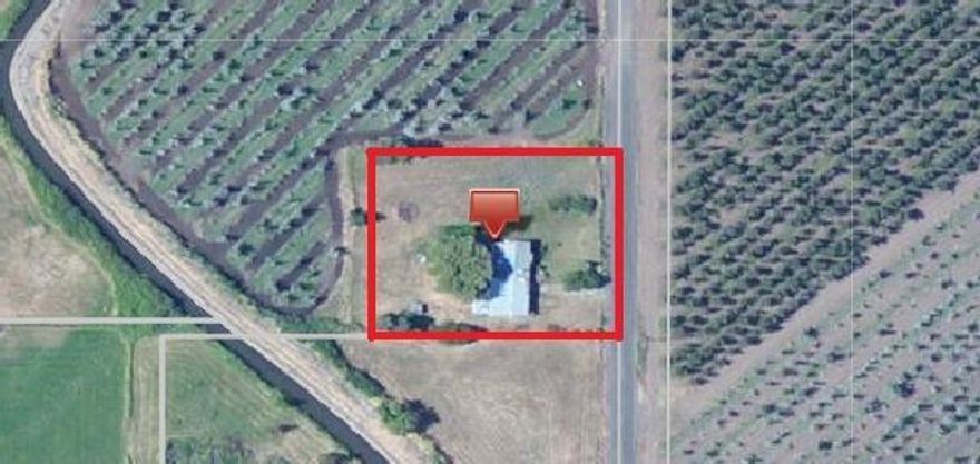 Are you looking for a home in Talent area that is not in a subdivision? This opportunity awaits you. This home is located on a spacious .70 acre lot with irrigation in the beautiful outskirts of Talent surrounded by rolling countryside, and views of the hills. The home is in need of some TLC and is being sold as is. Buyer to do own due diligence regarding all aspects of property.