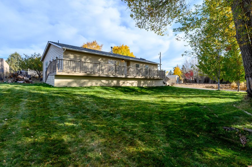 Looking for an affordable efficient single level home on an irrigated small acreage parcel located in the Tumalo area that has ample covered & enclosed parking along w/a shop/garage, then look no further. This well-built & nicely laid out Fuqua has hardy plank siding, a good roof, newly painted & extensive front porch, irrigation pond in front for viewing & water storage, a beautiful front yard & a private back yard w/fruit bearing pear/apple trees & quaking aspens all maintained by an automatic sprinkler system. The interior of the home is immaculate & features a great room layout, additional family room, primary separation, a good utility w/washer/dryer included. The kitchen has an efficient/spacious layout along w/newer cabinets, counters, & appliances. The primary has a large soaker tub & enclosed stall shower/water closet. The detached shop/garage is fully insulated w/garage door opener & has a 60amp subpanel w/plugs throughout. The RV Shop is 36'x16' w/a 12' tall door opening.