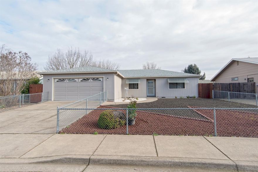Charming single level home in Medford! This home offers an open floor plan with 3 spacious bedrooms and 2 bathrooms. Newer Carpet (2017) and a fresh coat of paint on the exterior of the home. Yard is fully fenced and front yard beautifully zero-scaped for your convenience! Master bedroom includes very large walk-in closet. This home is ready for you to move in!