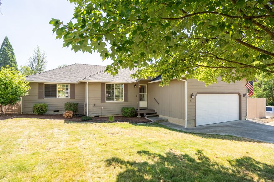 This three-bedroom, two-bath home comes with a solar system included in the purchase price. The current electric bill is less than $20 a month!! The layout features a split floor plan with a spacious great room at the center. The great room boasts high ceilings in the living area and vaulted ceilings in the kitchen, creating a bright and open atmosphere. French doors in the kitchen provide access to a large backyard, (inground sprinklers not currently being used) perfect for outdoor activities. The kitchen is equipped with a gas stove and ample counter space. Additionally, there is plenty of room to park your RV and/or boat next to the garage. Located on a quiet cul-de-sac in a comfortable neighborhood, this home is ideal for comfortable living.