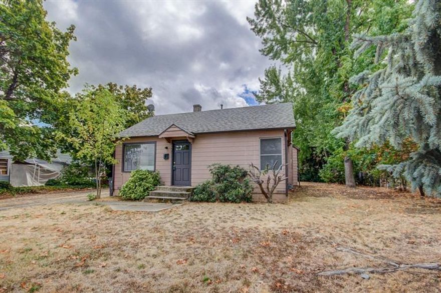 Perfect for the first time home owner! Right across from Washington Elementary field on a large lot with alley access check with the city for development possibilities. Load up the detached garage and shop with your favorite hobbies! New interior paint and carpet, clean and ready to move in!