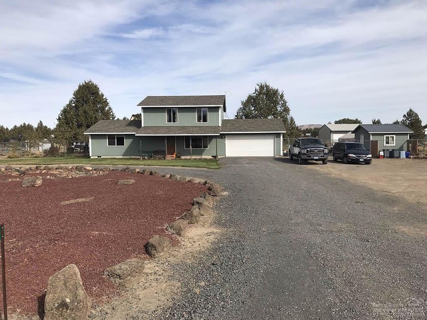 Inviting cozy well maintained home with living/dining, kitchen plus 2 bedrooms & full bath on the main floor. Easy care laminate flooring. Upstairs bedroom, bath plus bonus room which is being used as a master. 12x40 patio. Amazing flat lush back yard with garden, plum, apple, pear trees, strawberries/raspberries. For full price offer sellers will leave chicken coop w/chickens, trampoline, carport, pool. Rm for RV/boats, RV hookup 12x16 shed w/power.